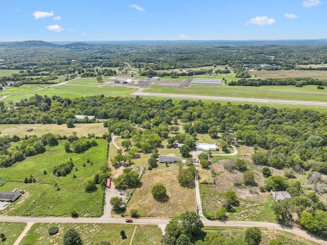 birds eye view of property featuring a rural view