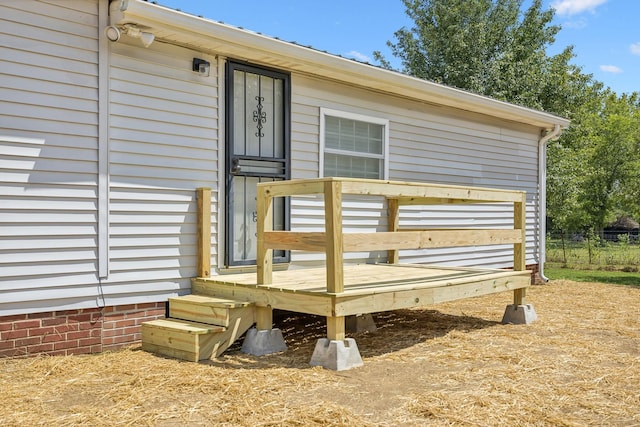 exterior space featuring a wooden deck