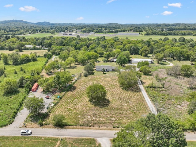 birds eye view of property featuring a rural view