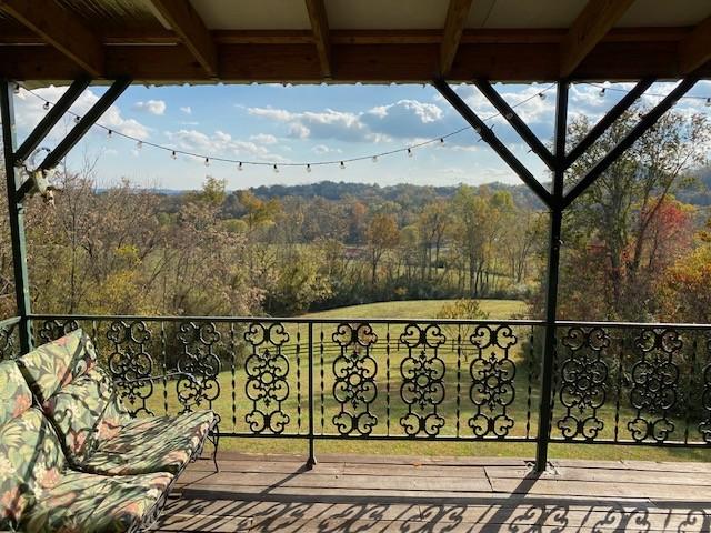 balcony with a view of trees