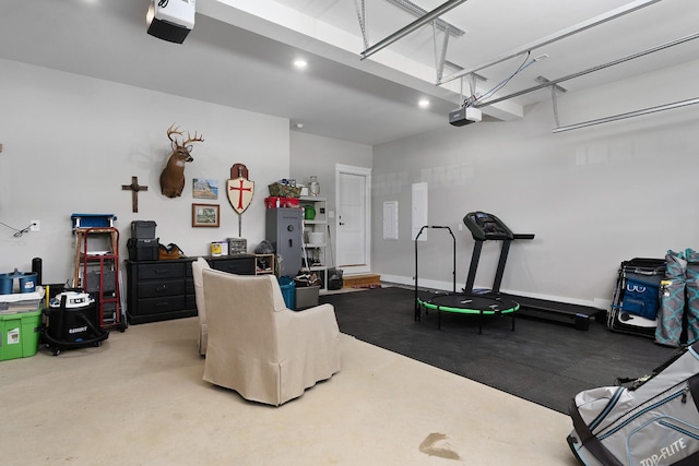 8858 Silver Maple Dr, Ooltewah, TN 37363 - garage featuring baseboards, recessed lighting, and a garage door opener