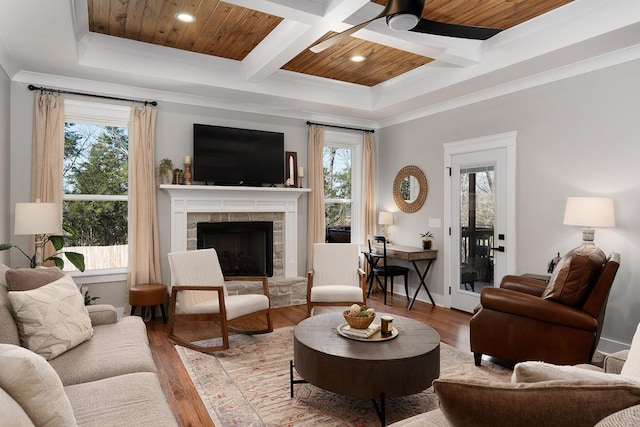 8858 Silver Maple Dr, Ooltewah, TN 37363 - living room with wooden ceiling, a fireplace, coffered ceiling, wood finished floors, and a ceiling fan