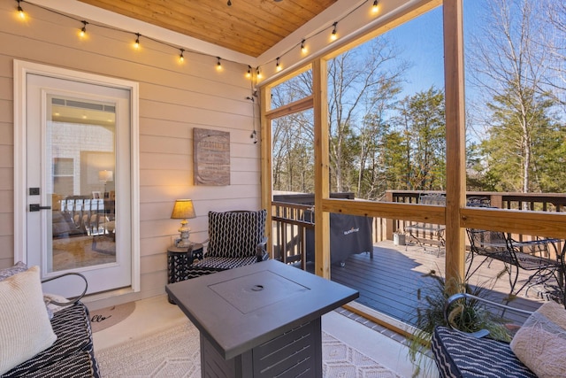 8858 Silver Maple Dr, Ooltewah, TN 37363 - sunroom featuring wood ceiling and track lighting