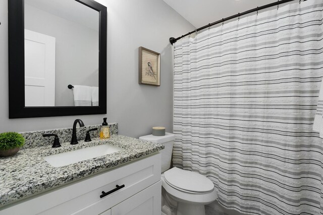 8858 Silver Maple Dr, Ooltewah, TN 37363 - full bath with a shower with shower curtain, vanity, and toilet
