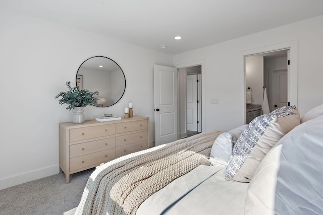 bedroom featuring light carpet, recessed lighting, and baseboards