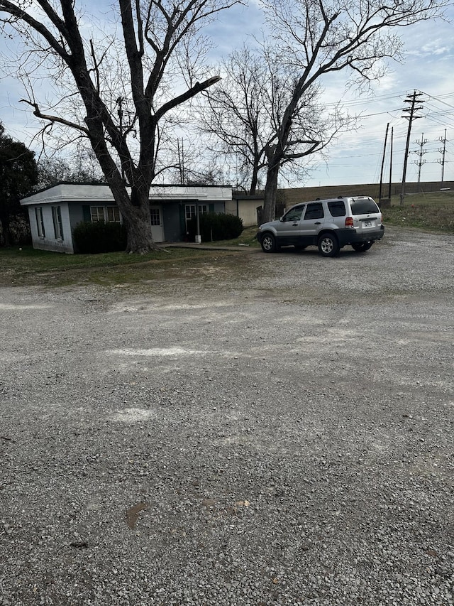 view of parking featuring driveway