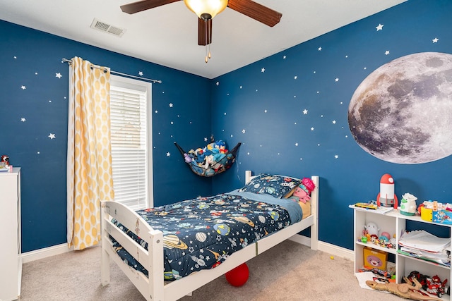 bedroom with a ceiling fan, carpet, visible vents, and baseboards