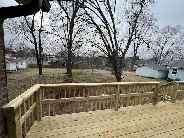 wooden deck featuring an outdoor structure