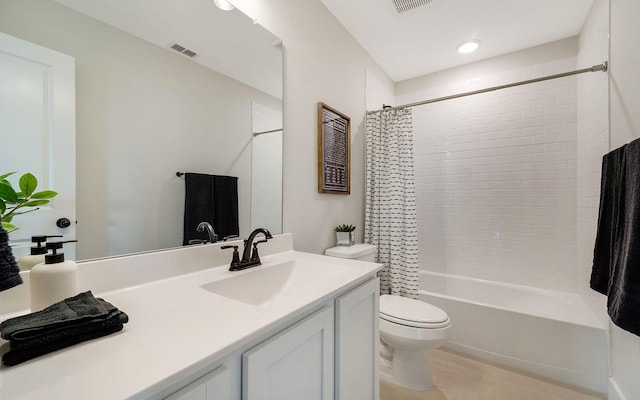 bathroom with visible vents, shower / bath combo with shower curtain, toilet, and vanity