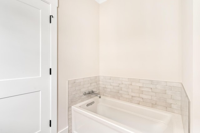 full bathroom featuring a garden tub