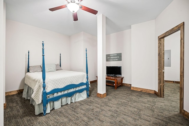 bedroom featuring carpet floors, electric panel, baseboards, and a ceiling fan