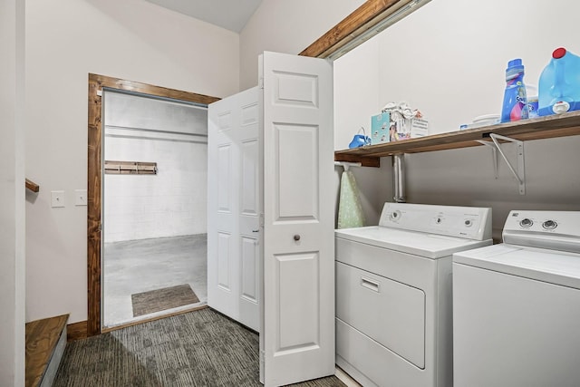 laundry room with washer and dryer and laundry area