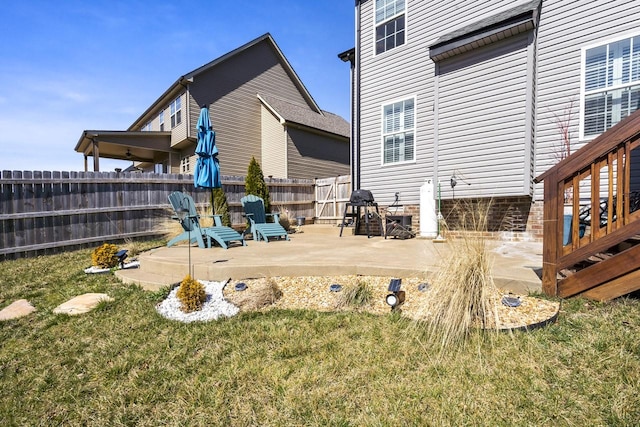 exterior space with a patio and fence