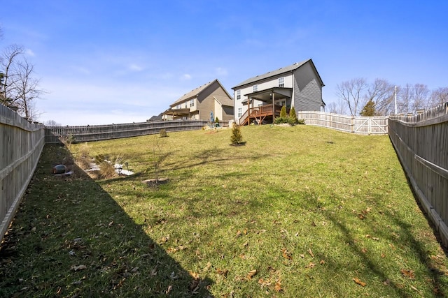 view of yard featuring a fenced backyard