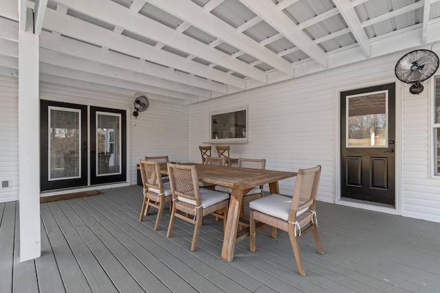 wooden terrace with outdoor dining area