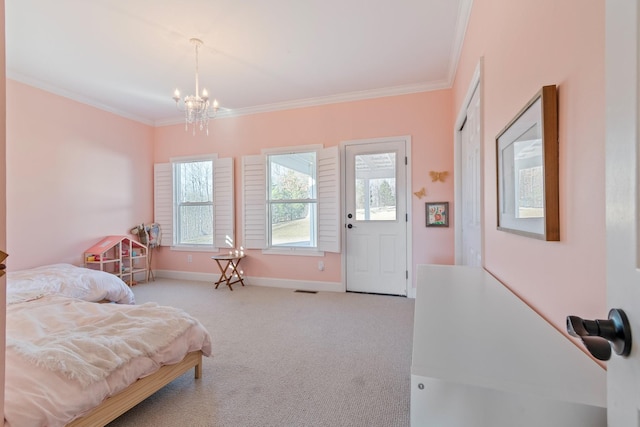 bedroom featuring carpet floors, crown molding, baseboards, and an inviting chandelier