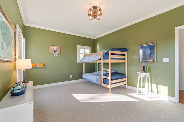 bedroom with baseboards, carpet flooring, and ornamental molding