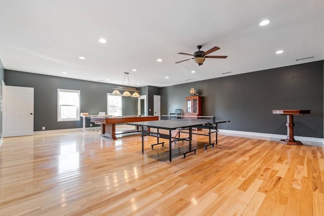 rec room with a ceiling fan, recessed lighting, light wood-style flooring, and baseboards