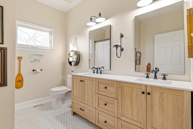 full bathroom with toilet, tile patterned flooring, visible vents, and a sink