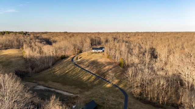 aerial view with a wooded view