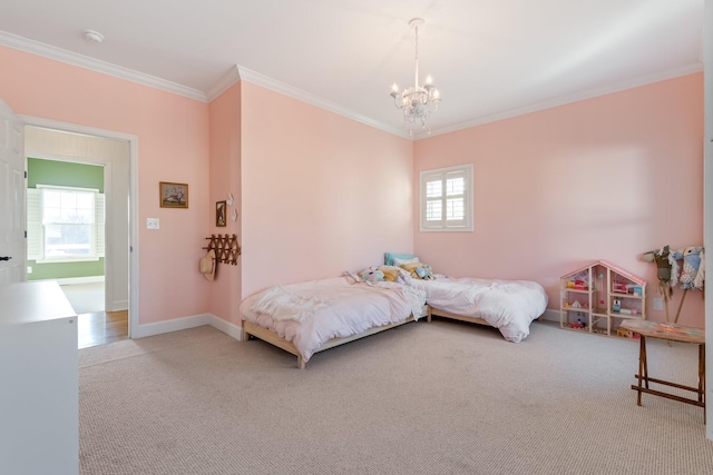 carpeted bedroom featuring baseboards, ornamental molding, multiple windows, and a notable chandelier