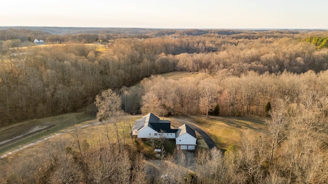 aerial view with a forest view and a rural view