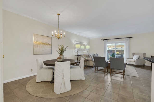 tiled dining area featuring baseboards, ornamental molding, and a chandelier