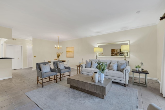 living room with crown molding, a notable chandelier, visible vents, tile patterned flooring, and baseboards