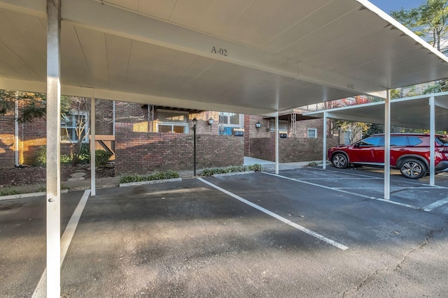 covered parking lot with fence