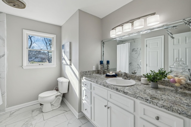 full bathroom with baseboards, toilet, a shower with curtain, marble finish floor, and vanity