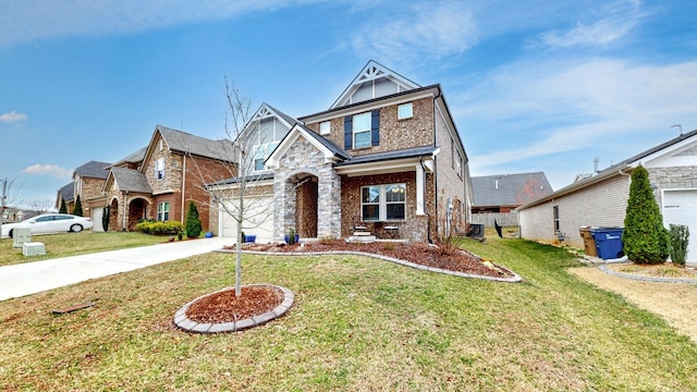 view of front of house with driveway, a garage, stone siding, a front lawn, and brick siding