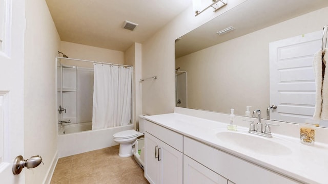 bathroom featuring toilet, shower / tub combo, vanity, and visible vents