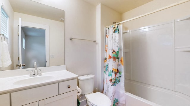 full bath with shower / bathtub combination with curtain, toilet, and vanity