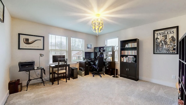 office featuring baseboards and carpet flooring