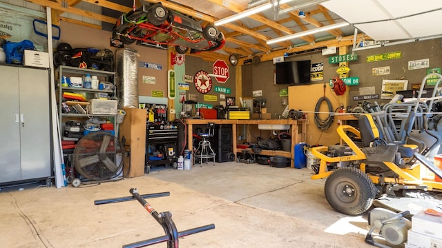 garage with a workshop area