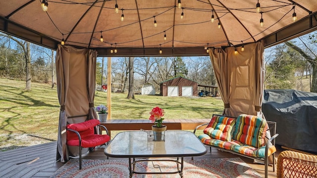 sunroom / solarium featuring vaulted ceiling, a wealth of natural light, and track lighting