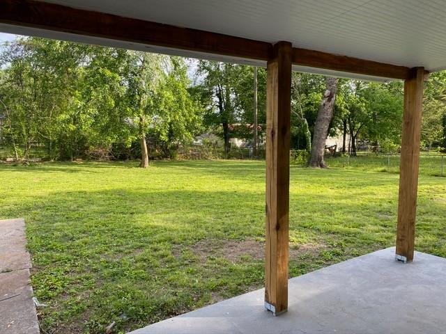 view of yard with a patio area