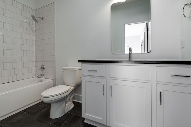 bathroom with toilet, shower / tub combination, tile patterned flooring, and vanity