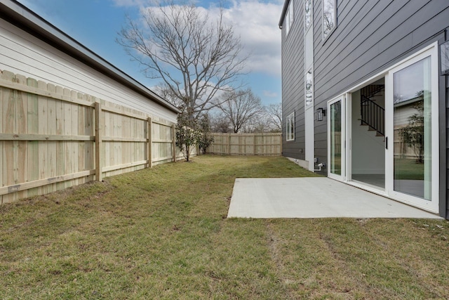 view of yard featuring a fenced backyard and a patio