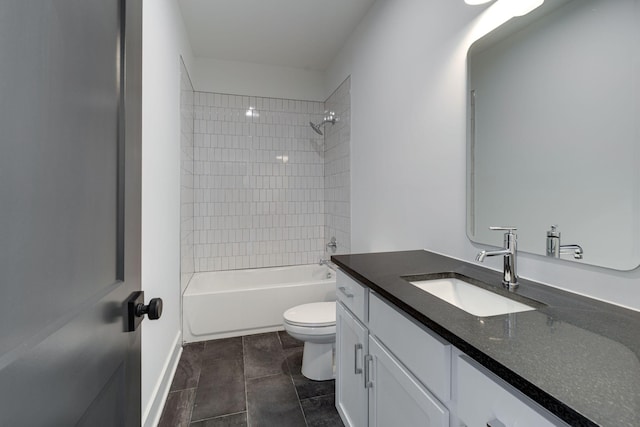 bathroom featuring vanity, toilet, and shower / bathtub combination