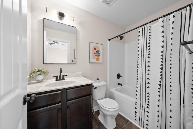 bathroom with visible vents, bathing tub / shower combination, toilet, tile patterned floors, and vanity