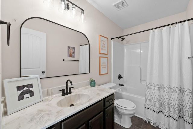 full bathroom featuring visible vents, toilet, shower / bath combo with shower curtain, vanity, and tile patterned floors