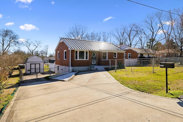 ranch-style home with a standing seam roof, a gate, fence, and brick siding