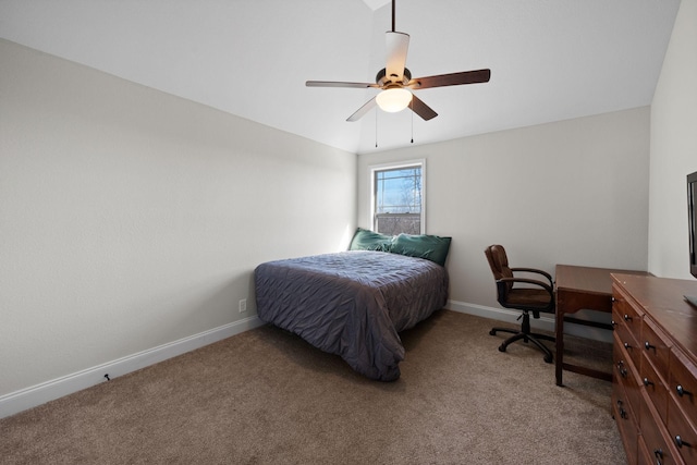 carpeted bedroom with a ceiling fan and baseboards