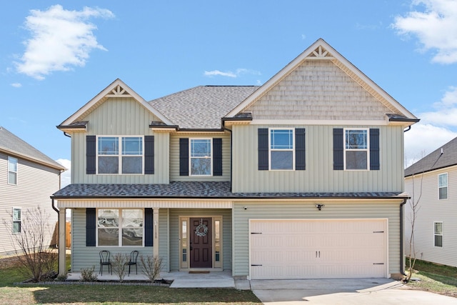 view of front of house with a garage, a shingled roof, concrete driveway, a porch, and board and batten siding