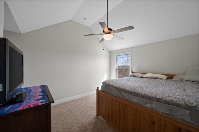 bedroom with carpet floors, lofted ceiling, baseboards, and a ceiling fan