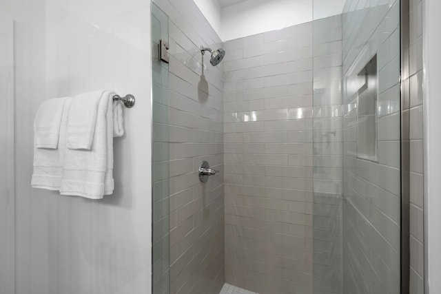 full bathroom featuring a shower stall