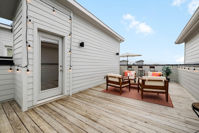 deck with an outdoor hangout area