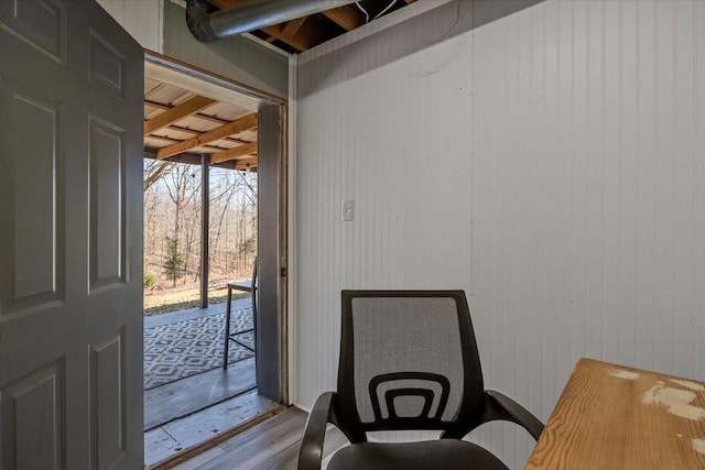 doorway with wood finished floors