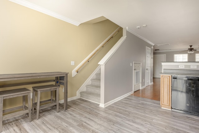 1382 Rural Hill Rd Unit 148, Antioch, TN 37013 - interior space featuring light wood finished floors, baseboards, ornamental molding, and stainless steel dishwasher
